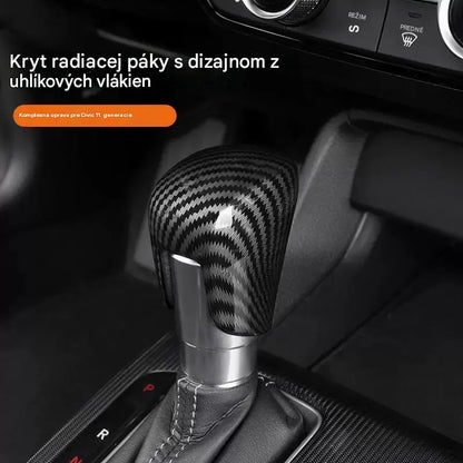 Dekoratívny kryt radiacej páky z uhlíkových vlákien
