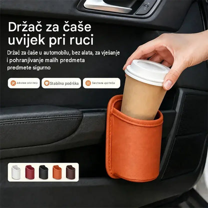 【2 komad 22 eura】🥳💞Prodano preko 50.000 primjeraka! 🚗🧺Držač za čaše od kože za vrata automobila – Široki otvor za jednostavan pristup pićima i telefonu. Kopča se za sigurno pričvršćivanje. Izrađen od izdržljive i elegantne PU kože. 🛡️✨